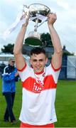 26 July 2017; Ciaran Steele of Derry holds the cup aloft after the Bord Gáis Energy Ulster GAA Hurling U21 Championship Final match between Derry and Down at Corrigan Park in Belfast. Photo by Oliver McVeigh/Sportsfile