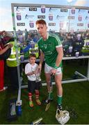 26 July 2017; Cian Lynch of Limerick receives the Man of the Match Award from Michael Murphy, age 7, from Ballygiblin Hurling Club, Mitchelstown, Cork, after the Bord Gáis Energy Munster GAA Hurling Under 21 Championship Final match between Limerick and Cork at the Gaelic Grounds in Limerick. Photo by Stephen McCarthy/Sportsfile