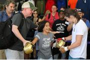 26 July 2017; Katie Taylor with 11 year old fan Jesselyn Silva during an open workout session in Modell's Sporting Goods in Brooklyn, New York, USA. Photo by Ed Diller/ DiBella Entertainment / Sportsfile