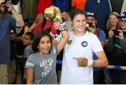 26 July 2017; Katie Taylor with 11 year old fan Jesselyn Silva during an open workout session in Modell's Sporting Goods in Brooklyn, New York, USA. Photo by Ed Diller/ DiBella Entertainment / Sportsfile