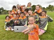 27 July 2017; Kayla McKiernan takes a selfie with her friends and Mayo's Lee Keegan during Lee's Kellogg’s GAA Cul Camps Surprise Visit at Leitrim Town Centre in Leitrim. Photo by Matt Browne/Sportsfile
