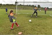 27 July 2017; Robyn Willow Guckian takes a penalty against Lee  during the Lee Keegan's Kellogg’s GAA Cul Camps Surprise Visit at Leitrim Town Centre in Leitrim. Photo by Matt Browne/Sportsfile