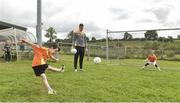 27 July 2017; Sean O'Brien takes a penalty watches by Lee during the Lee Keegan's Kellogg’s GAA Cul Camps Surprise Visit at Leitrim Town Centre in Leitrim. Photo by Matt Browne/Sportsfile