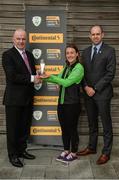 27 July 2017; Pictured is Lucy McCartan from Peamount United being presented with the Continental Tyres Women's National League Player of the Month Award for June 2017 by Tom Dennigan, General Manager, Continental Tyres Ireland, left, alongside Eamonn Breen, FAI Executive Committee, at the FAI HQ in Abbotstown, Dublin.  Photo by Cody Glenn/Sportsfile