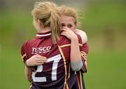 31 March 2012; Niamh Browne, right, is comforted by her Loreto Convent team mate Eireann McSorley after the game. Tesco All-Ireland Post Primary Schools Junior A Final, Colaiste Dun Iascaigh, Cahir, Co. Tipperary v Loreto Convent, Omagh, Co. Tyrone, Moate GAA Club, Hogan Park, Moate, Co. Westmeath. Picture credit: Ray McManus / SPORTSFILE