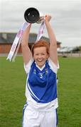 31 March 2012; The Colaiste Dun Iascaigh captain Emma Corcoran lifts the cup. Tesco All-Ireland Post Primary Schools Junior A Final, Colaiste Dun Iascaigh, Cahir, Co. Tipperary v Loreto Convent, Omagh, Co. Tyrone, Moate GAA Club, Hogan Park, Moate, Co. Westmeath. Picture credit: Ray McManus / SPORTSFILE