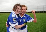 31 March 2012; Colaiste Dun Iascaigh players Kate O'Brien, left, and Aoife Corcoran celebrate after the game. Tesco All-Ireland Post Primary Schools Junior A Final, Colaiste Dun Iascaigh, Cahir, Co. Tipperary v Loreto Convent, Omagh, Co. Tyrone, Moate GAA Club, Hogan Park, Moate, Co. Westmeath. Picture credit: Ray McManus / SPORTSFILE