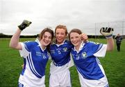 31 March 2012; Colaiste Dun Iascaigh players Kate O'Brien, left, Aoife Corcoran and Roisin Howard, right, celebrate after the game. Tesco All-Ireland Post Primary Schools Junior A Final, Colaiste Dun Iascaigh, Cahir, Co. Tipperary v Loreto Convent, Omagh, Co. Tyrone, Moate GAA Club, Hogan Park, Moate, Co. Westmeath. Picture credit: Ray McManus / SPORTSFILE