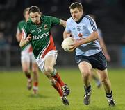 31 March 2012; Kevin McManamon, Dublin, in action against Peadar Gardiner, Mayo. Allianz Football League, Division 1, Round 2, Refixture, Mayo v Dublin, McHale Park, Castlebar, Co. Mayo. Picture credit: David Maher / SPORTSFILE