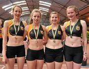 1 April 2012; The Kilkenny City Harriers A.C., Co. Kilkenny, team, winners of the U-19 Girls 4 x 100m, from left, Cliodhna Manning, Lorraine O'Shea, Caitriona Twomey and Caitriona McDonough at the Woodie’s DIY AAI Juvenile Indoor Championships of Ireland. Nenagh Indoor Arena, Nenagh, Co. Tipperary. Picture credit: Barry Cregg / SPORTSFILE