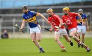 1 April 2012; Thomas Stapleton, Tipperary, in action against Darren Sweetnam, centre, and Cathal Naughton, Cork. Allianz Hurling League Division 1A, Round 5, Tipperary v Cork, Semple Stadium, Thurles, Co. Tipperary. Picture credit: Brendan Moran / SPORTSFILE