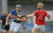 1 April 2012; James Woodlock, Tipperary, in action against Darren Sweetnam, Cork. Allianz Hurling League Division 1A, Round 5, Tipperary v Cork, Semple Stadium, Thurles, Co. Tipperary. Picture credit: Brendan Moran / SPORTSFILE