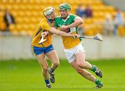 1 April 2012; Eanna Murphy, Offaly, in action against Aaron Cunningham, Clare. Allianz Hurling League Division 1B, Round 5, Offaly v Clare, O'Connor Park, Tullamore, Co. Offaly. Photo by Sportsfile
