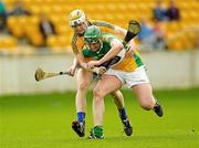 1 April 2012; Eanna Murphy, Offaly, in action against Aaron Cunningham, Clare. Allianz Hurling League Division 1B, Round 5, Offaly v Clare, O'Connor Park, Tullamore, Co. Offaly. Photo by Sportsfile