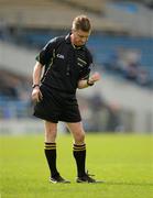1 April 2012; Referee Barry Kelly indicates a free for holding. Allianz Hurling League Division 1A, Round 5, Tipperary v Cork, Semple Stadium, Thurles, Co. Tipperary. Picture credit: Brendan Moran / SPORTSFILE
