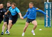 2 April 2012; Leinster players, from left, Richardt Strauss, Gordon D'Arcy, Sean Cronin and Luke Fitzgerald during squad training ahead of their side's Heineken Cup Quarter-Final game against Cardiff Blues on Saturday. Leinster Rugby Squad Training. UCD, Belfield, Dublin. Picture credit: Brendan Moran / SPORTSFILE