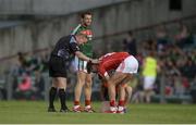 22 July 2017; Referee Ciarán Branagan checks Aidan Walsh of Cork after he picked up an injury during the GAA Football All-Ireland Senior Championship Round 4A match between Cork and Mayo at Gaelic Grounds in Co. Limerick. Photo by Piaras Ó Mídheach/Sportsfile