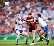 29 July 2017; Connaire Harrison of Down in action against Drew Wylie, right, and Colin Walshe of Monaghan during the GAA Football All-Ireland Senior Championship Round 4B match between Down and Monaghan at Croke Park in Dublin. Photo by Stephen McCarthy/Sportsfile