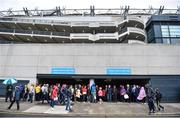 30 July 2017; Supporters take shelter from the rain ahead of the GAA Football All-Ireland Senior Championship Quarter-Final match between Mayo and Roscommon at Croke Park in Dublin. Photo by Ramsey Cardy/Sportsfile