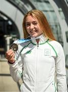 30 July 2017; Team Ireland arrive at Dublin Airport with 6 medals following competition at the 2017 European Youth Olympic Festival, EYOF, in Gyor, Hungary. The multi-sport event saw 40 Irish athletes, aged 14-16, compete against the best youth athletes in Europe. The six sports represented by Ireland were Athletics, Cycling, Swimming, Judo, Tennis and Gymnastics. Pictured is Team Ireland's Lara Gillespie, from Enniskerry, Co. Wicklow, with her silver medal for second place in the women's cycling time trial, at Dublin Airport, Dublin. Photo by Seb Daly/Sportsfile