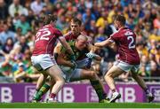 30 July 2017; Kieran Donaghy of Kerry is tackled by David Walsh, left, Liam Silke and David Walsh of Galway during the GAA Football All-Ireland Senior Championship Quarter-Final match between Kerry and Galway at Croke Park in Dublin. Photo by Ramsey Cardy/Sportsfile