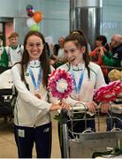 30 July 2017; Team Ireland arrive at Dublin Airport with 6 medals following competition at the 2017 European Youth Olympic Festival, EYOF, in Gyor, Hungary. The multi-sport event saw 40 Irish athletes, aged 14-16, compete against the best youth athletes in Europe. The six sports represented by Ireland were Athletics, Cycling, Swimming, Judo, Tennis and Gymnastics. Pictured is Team Ireland's Miriam Daly, from Carrick-on-Suir, Co. Tipperary, and Niamh Foley, from Newcastle, Co. Limerick, who won bronze in the women's 4x100 relay, at Dublin Airport, Dublin. Photo by Seb Daly/Sportsfile
