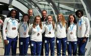 30 July 2017; Team Ireland arrive at Dublin Airport with 6 medals following competition at the 2017 European Youth Olympic Festival, EYOF, in Gyor, Hungary. The multi-sport event saw 40 Irish athletes, aged 14-16, compete against the best youth athletes in Europe. The six sports represented by Ireland were Athletics, Cycling, Swimming, Judo, Tennis and Gymnastics. Pictured is Team Ireland's medal winners, from left, Patience Jumbo Gula, from Dundalk, Co. Louth, Niamh Foley, from Newcastle, Co. Limerick, Jade Williams, from Baillieborough, Co. Cavan, Sarah Healy, from Monktown, Co. Dublin, Lara Gillespie, from Enniskerry, Co. Wicklow, Miriam Daly, from Carrick-on-Suir, Co. Tipperary, and Rhasidat Adeleke, from Tallaght, Dublin, with Chef de Mission Martin Burke and Steve Martin, at Dublin Airport, Dublin. Photo by Seb Daly/Sportsfile
