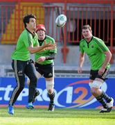 4 April 2012; Munster's Conor Murray, left, Paul O'Connell, centre, and Donnacha Ryan in action during squad training ahead of their Heineken Cup Quarter-Final game against Ulster on Sunday. Munster Rugby Squad Training, Thomond Park, Limerick. Picture credit: Diarmuid Greene / SPORTSFILE