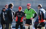 4 April 2012; Munster's Paul O'Connell, alongside team-mates, in conversation with assistant coach Anthony Foley during squad training ahead of their Heineken Cup Quarter-Final game against Ulster on Sunday. Munster Rugby Squad Training, Thomond Park, Limerick. Picture credit: Diarmuid Greene / SPORTSFILE