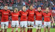31 March 2012; Munster players, from left to right, Peter O'Mahony, Keith Earls, Johne Murphy, Donncha O'Callaghan, James Coughlan and Tomas O'Leary stand for a minute silence before the game in memory of the late Cyril Fitzgerald RIP, former Munster Branch President. Celtic League, Munster v Leinster, Thomond Park, Limerick. Picture credit: Diarmuid Greene / SPORTSFILE