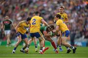 30 July 2017; Andy Moran of Mayo in action against Niall Kilroy of Roscommon, left, Sean McDermott, centre, and David Murray during the GAA Football All-Ireland Senior Championship Quarter-Final match between Mayo and Roscommon at Croke Park in Dublin. Photo by Ray McManus/Sportsfile