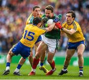 30 July 2017; Andy Moran of Mayo in action against Niall Kilroy , 15, Fintan Cregg and David Murray of Roscommon during the GAA Football All-Ireland Senior Championship Quarter-Final match between Mayo and Roscommon at Croke Park in Dublin. Photo by Ray McManus/Sportsfile