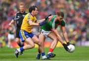 30 July 2017; Aidan O'Shea of Mayo is tackled by Niall Kilroy  of Roscommon during the GAA Football All-Ireland Senior Championship Quarter-Final match between Mayo and Roscommon at Croke Park in Dublin. Photo by Ramsey Cardy/Sportsfile
