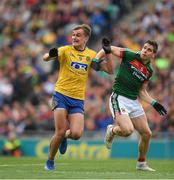 30 July 2017; Enda Smith of Roscommon and Lee Keegan of Mayo jostle for possession during the GAA Football All-Ireland Senior Championship Quarter-Final match between Mayo and Roscommon at Croke Park in Dublin. Photo by Ray McManus/Sportsfile