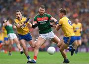 30 July 2017; Aidan O'Shea of Mayo in action against Niall Kilroy , left, and Sean Mullooly of Roscommon during the GAA Football All-Ireland Senior Championship Quarter-Final match between Mayo and Roscommon at Croke Park in Dublin. Photo by Ray McManus/Sportsfile