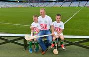 31 July 2017; In attendance is former Cork hurler and #hurlthehabit ambassador Joe Deane with his sons, Eolann Deane, age 6, left, and Cormac Deane, age 9, from Killeagh GAA, Co Cork, at the launch of the 2017 GAA Health & Wellbeing Theme Day, taking place on August 13th in Croke Park for the All Ireland Hurling Semi-final between Cork and Waterford. For more information, visit: www.gaa.ie/community Follow: @officialgaa or Like: www.facebook.com/officialgaa. Croke Park, in Dublin. Photo by Piaras Ó Mídheach/Sportsfile