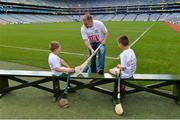 31 July 2017; In attendance is former Cork hurler and #hurlthehabit ambassador Joe Deane with his sons, Eolann Deane, age 6, left, and Cormac Deane, age 9, from Killeagh GAA, Co Cork, at the launch of the 2017 GAA Health & Wellbeing Theme Day, taking place on August 13th in Croke Park for the All Ireland Hurling Semi-final between Cork and Waterford. For more information, visit: www.gaa.ie/community Follow: @officialgaa or Like: www.facebook.com/officialgaa. Croke Park, in Dublin. Photo by Piaras Ó Mídheach/Sportsfile
