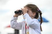 31 July 2017; A young racegoer follows the runners and riders during the Galway Races Summer Festival 2017 at Ballybrit, in Galway. Photo by Cody Glenn/Sportsfile
