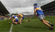 22 July 2017; John McGrath, 15, and John O'Dwyer of Tipperary in action against Seadna Morey and Patrick O'Connor of Clare during the GAA Hurling All-Ireland Senior Championship Quarter-Final match between Clare and Tipperary at Páirc Uí Chaoimh in Cork. Photo by Ray McManus/Sportsfile