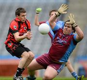 7 April 2012; The St. Michael's goalkeeper, Paddy Sweeney, saves a shot from Sean Doyle, St Mary's. All-Ireland Colleges Senior Football Championship Final, St. Marys, Edenderry, Co. Offaly v St. Michael's, Enniskillen, Co. Fermanagh, Croke Park, Dublin. Picture credit: Ray McManus / SPORTSFILE