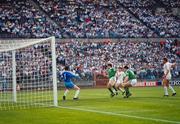 15 June 1988; Ray Houghton of Republic of Ireland, supported by team-mate John Aldridge, has an attempt on goal during the UEFA European Football Championship Finals Group B match between Republic of Ireland and USSR at the Niedersachen Stadium in Hanover, Germany. Photo by Ray McManus/Sportsfile