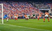 18 June 1988; Ray Houghton of Republic of Ireland in action against Gerald Vanenburg of Netherlands during the UEFA European Football Championship Finals Group B match between Republic of Ireland and Netherlands at Parkstadion in Gelsenkirchen, Germany. Photo by Ray McManus/Sportsfile