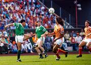 18 June 1988; Chris Hughton of Republic of Ireland in action against Ruud Gullit of Netherlands during the UEFA European Football Championship Finals Group B match between Republic of Ireland and Netherlands at Parkstadion in Gelsenkirchen, Germany. Photo by Ray McManus/Sportsfile