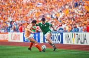 18 June 1988; Tony Galvin of Republic of Ireland in action against Berry van Basten of Netherlands during the UEFA European Football Championship Finals Group B match between Republic of Ireland and Netherlands at Parkstadion in Gelsenkirchen, Germany. Photo by Ray McManus/Sportsfile