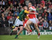 8 April 2012; Paddy Keenan, Louth, in action against Bryan Menton, Meath. Allianz Football League Division 2, Round 7, Meath v Louth, Pairc Tailteann, Navan, Co. Meath. Picture credit: Brian Lawless / SPORTSFILE
