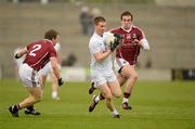 8 April 2012; Eoghan O'Flaherty, Kildare, in action against Kieran McGrath, left, and Nicky Joyce, right, Galway. Allianz Football League Division 2, Round 7, Galway v Kildare, Pearse Stadium, Galway. Picture credit: Barry Cregg / SPORTSFILE