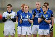 8 April 2012; Kerry players, from left, Brian Kelly, Johnny Buckley, Colm Cooper, Kieran Donaghy, Killian Young and Eoin Brosnan stand for a minute's applause in memory of the late John Egan who played intercounty football for Kerry from 1973 to 1984, winning 6 All-Ireland medals. Allianz Football League Division 1, Round 7, Kerry v Mayo, Austin Stack Park, Tralee, Co. Kerry. Picture credit: Brendan Moran / SPORTSFILE