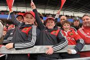8 April 2012; Munster supporters, from left to right, Dylan Murphy, aged 11, Ian Hinchy, aged 10, both from Ballyneety, Co. Limerick and Craig Bateman, aged 10, from Clonakilty, Co. Cork. Heineken Cup Quarter-Final, Munster v Ulster, Thomond Park, Limerick. Picture credit: Diarmuid Greene / SPORTSFILE