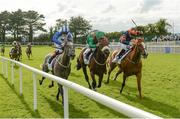 1 August 2017; Eventual winner Shekiba, right, with Gary Carroll up, race ahead of Raynama, with Pat Smullen up, who finished fourth, and Moghamarah, with Chris Hayes up, who finished second, on their way to winning the Colm Quinn BMW Irish EBF  Fillies Maiden during the Galway Races Summer Festival 2017 at Ballybrit, in Galway. Photo by Cody Glenn/Sportsfile