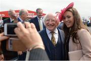 2 August 2017; The President of Ireland Michael D Higgins poses for a photograph with racegoer Sarah Gaughran, from Athenry, Co Galway, during the Galway Races Summer Festival 2017 at Ballybrit, in Galway. Photo by Cody Glenn/Sportsfile